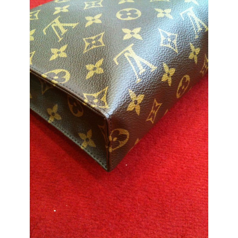 LOUIS VUITTON - Trousse de toilette GM en toile monogram…