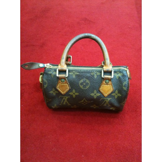 Mini sac Louis Vuitton HL en toile monogram