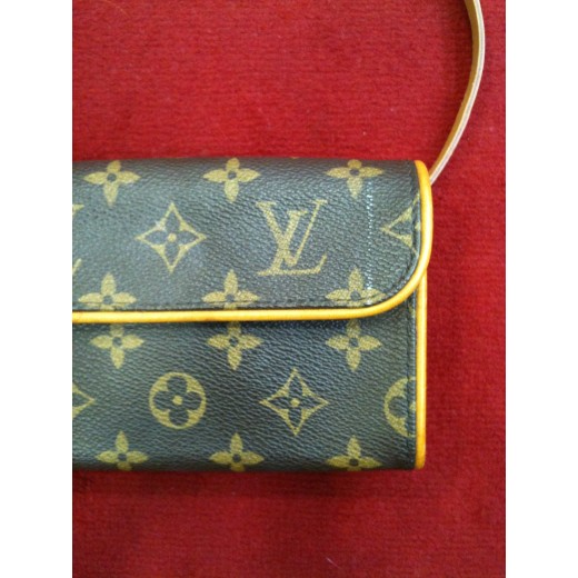 Pochette Louis Vuitton Florentine en toile monogram