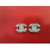 Boucles d'oreilles Chanel CC en métal serties de strass