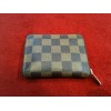 Porte-monnaie Louis Vuitton Zippy en toile damier 