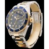 Montre Rolex Submariner Date Bleue en or et acier