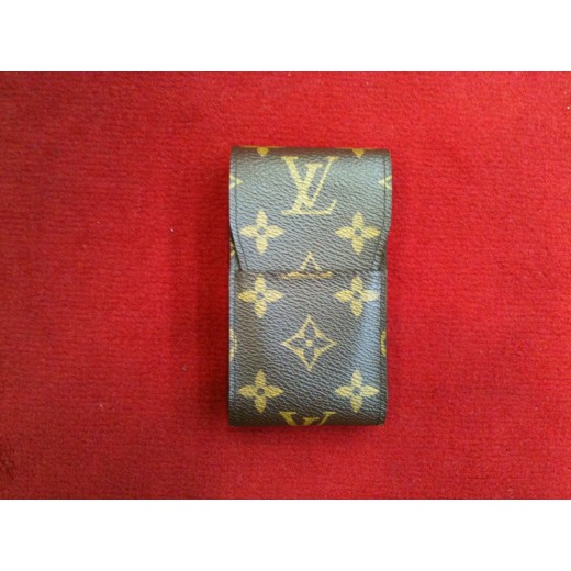 Etui à cigarettes Louis Vuitton en toile monogram.