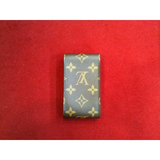 Etui à cigarettes Louis Vuitton en toile monogram.