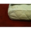 Sac Chanel en cuir matelassé beige