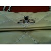 Sac Chanel en cuir matelassé beige