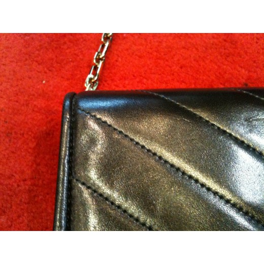 Pochette Yves Saint Laurent en cuir noir