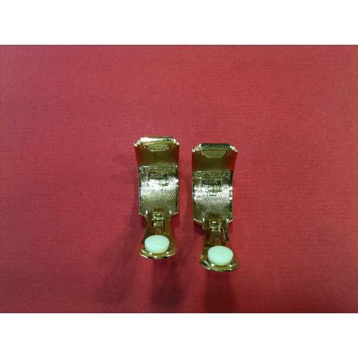 Boucles d'oreilles Hermès en émail et plaqué or