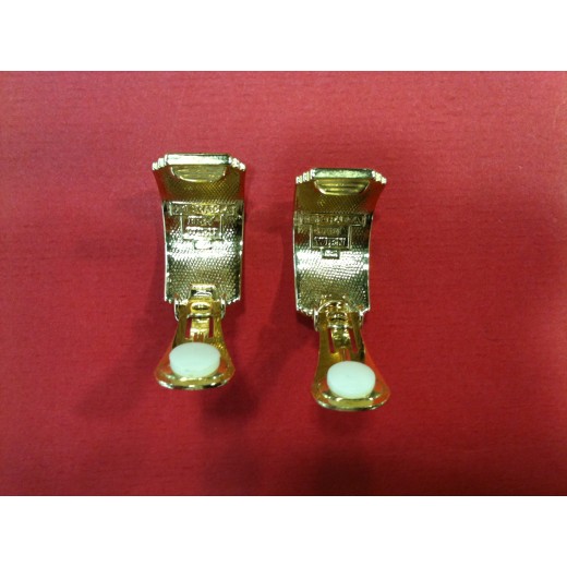 Boucles d'oreilles Hermès en émail et plaqué or