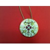 Pendentif Bernardaud Gong en porcelaine sur cordon