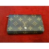 Portefeuille Louis Vuitton Trésor en toile monogram 