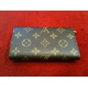 Portefeuille Louis Vuitton Trésor en toile monogram 