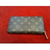 Portefeuille Louis Vuitton Zippy en toile monogram