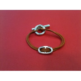 Bracelet Hermès Skipper en argent sur cordon orange