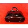 Sac Louis Vuitton Alma PM en cuir monogram vernis