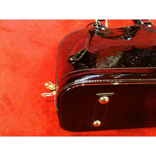 Sac Louis Vuitton Alma PM en cuir monogram vernis