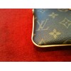 Pochette Louis Vuitton Milla MM en toile monogram