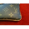 Pochette Louis Vuitton Milla MM en toile monogram