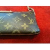 Pochette Louis Vuitton Milla MM en toile monogram