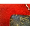 Pochette Louis Vuitton Milla MM en toile monogram