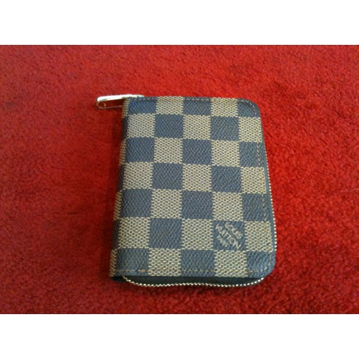 Porte-monnaie Louis Vuitton Zippy en toile damier ébène