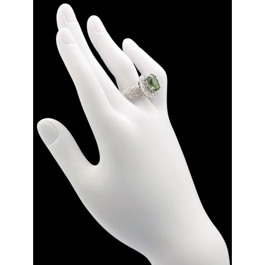 Bague marguerite en or, péridot et diamants