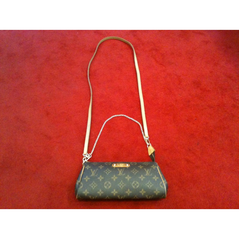 Pochette Louis Vuitton Eva en toile monogram