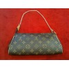 Pochette Louis Vuitton Eva en toile monogram