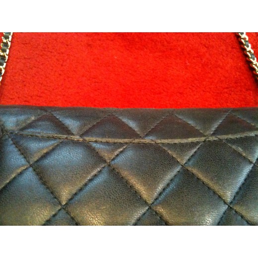 Pochette Chanel avec chaîne en agneau matelassé noir
