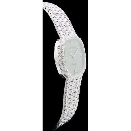 Montre bijou Longines en or et diamants