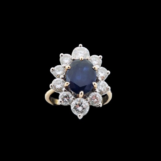 Bague marguerite deux ors, saphir et diamants