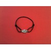 Bracelet Dinh Van Menottes R12 en argent sur cordon noir