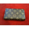 Portefeuille Louis Vuitton Alexandra en toile monogram 
