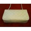 Sac Chanel en cuir matelassé beige