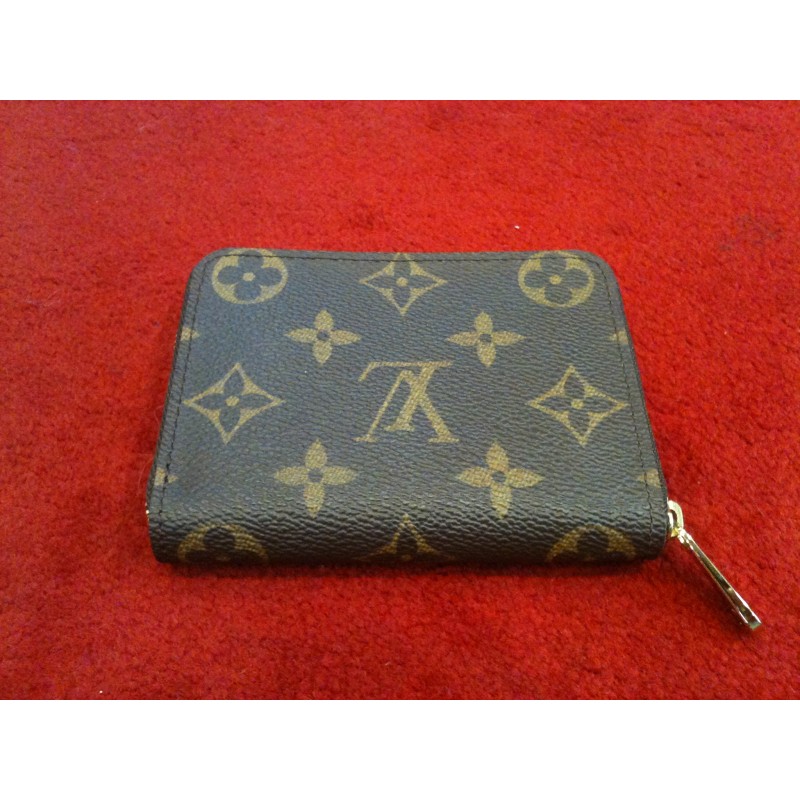 Porte-monnaie Louis Vuitton Zippy en toile monogram