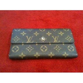 Portefeuille Louis Vuitton Trésor en toile monogram 