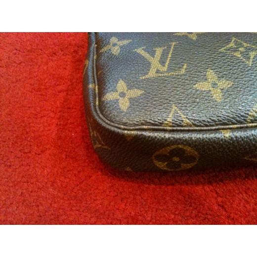 Mini Pochette Accessoires Louis Vuitton en toile monogram 