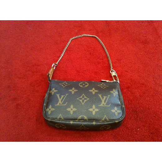Mini Pochette Accessoires Louis Vuitton en toile monogram 