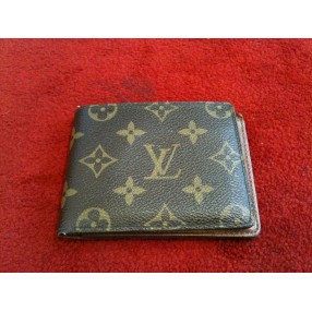 Portefeuille Louis Vuitton multiple en toile monogram 
