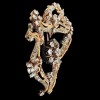 Broche Clip Arabesque en or et diamants