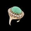 Bague Jade cabochon entourage diamants