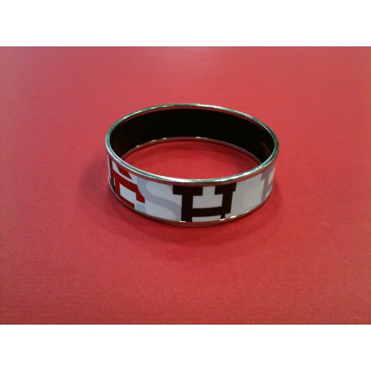 Bracelet Hermès en émail et plaqué or