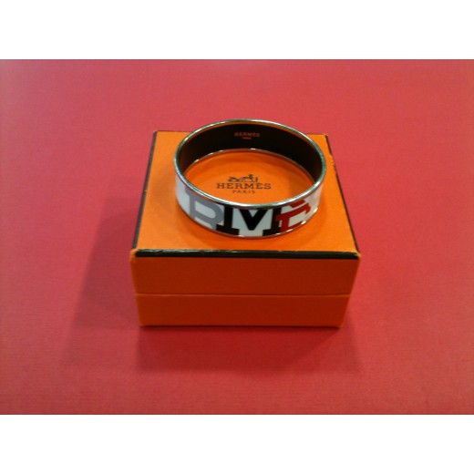Bracelet Hermès en émail et plaqué or