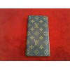 Portefeuille Louis Vuitton en toile monogram 