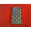 Portefeuille Louis Vuitton en toile monogram 