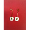 Boucles d'oreilles Bernardaud en porcelaine et plaqué or