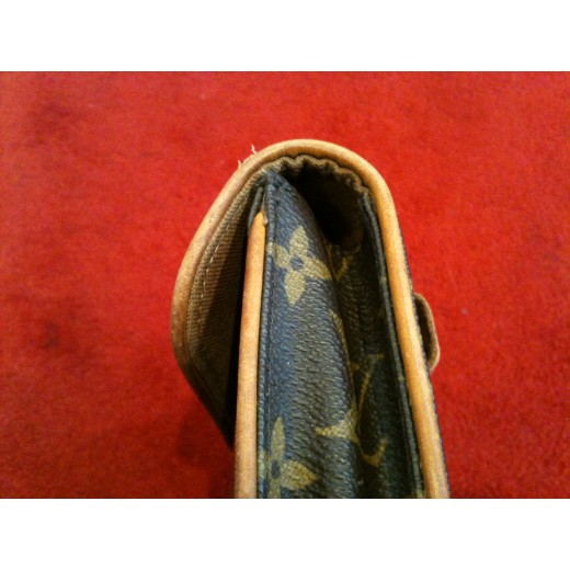 Pochette Louis Vuitton Florentine en toile monogram