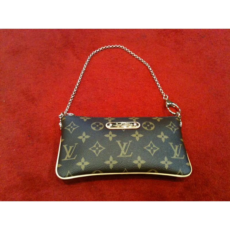 Pochette Louis Vuitton Milla MM en toile monogram