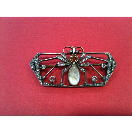 Broche ancienne en argent et roses de diamant