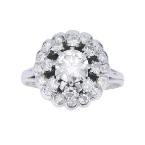 Bague marguerite ancienne en or blanc 18 K et diamants